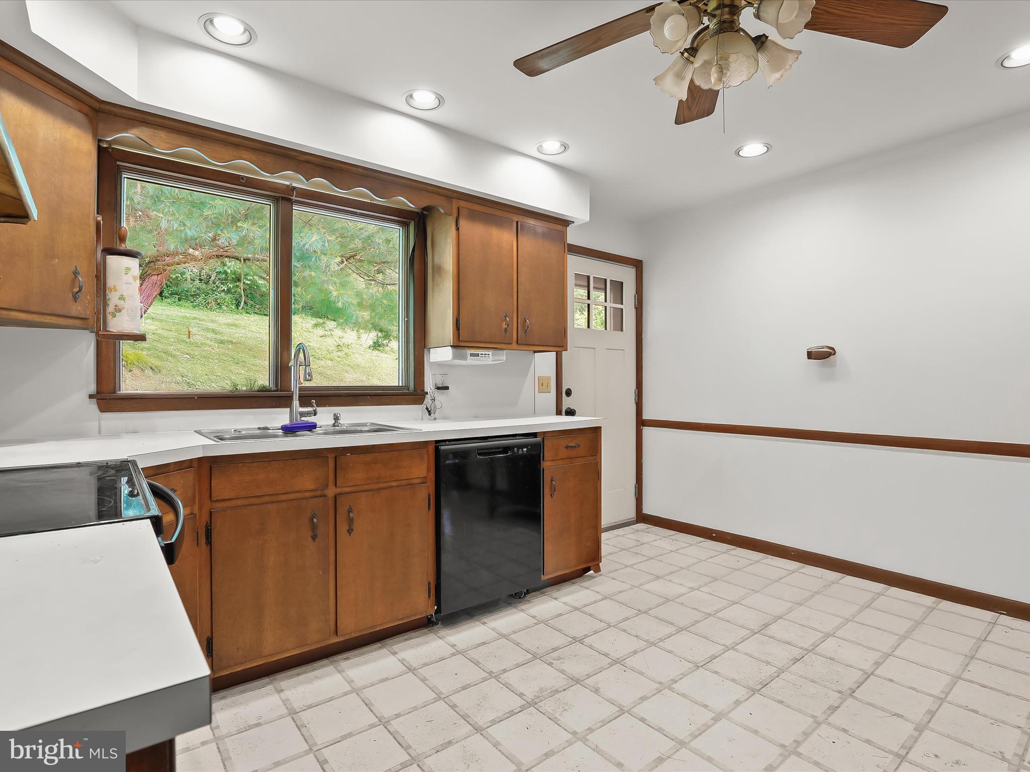 4704 Baughman Mill Road Manchester, MD 21102 - Photo 22 of 64 a kitchen with a sink cabinets and window