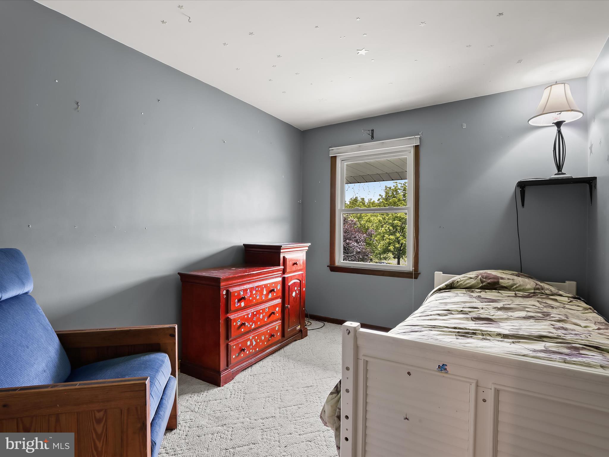 4704 Baughman Mill Road Manchester, MD 21102 - Photo 28 of 64 a bed room with a bed and a window