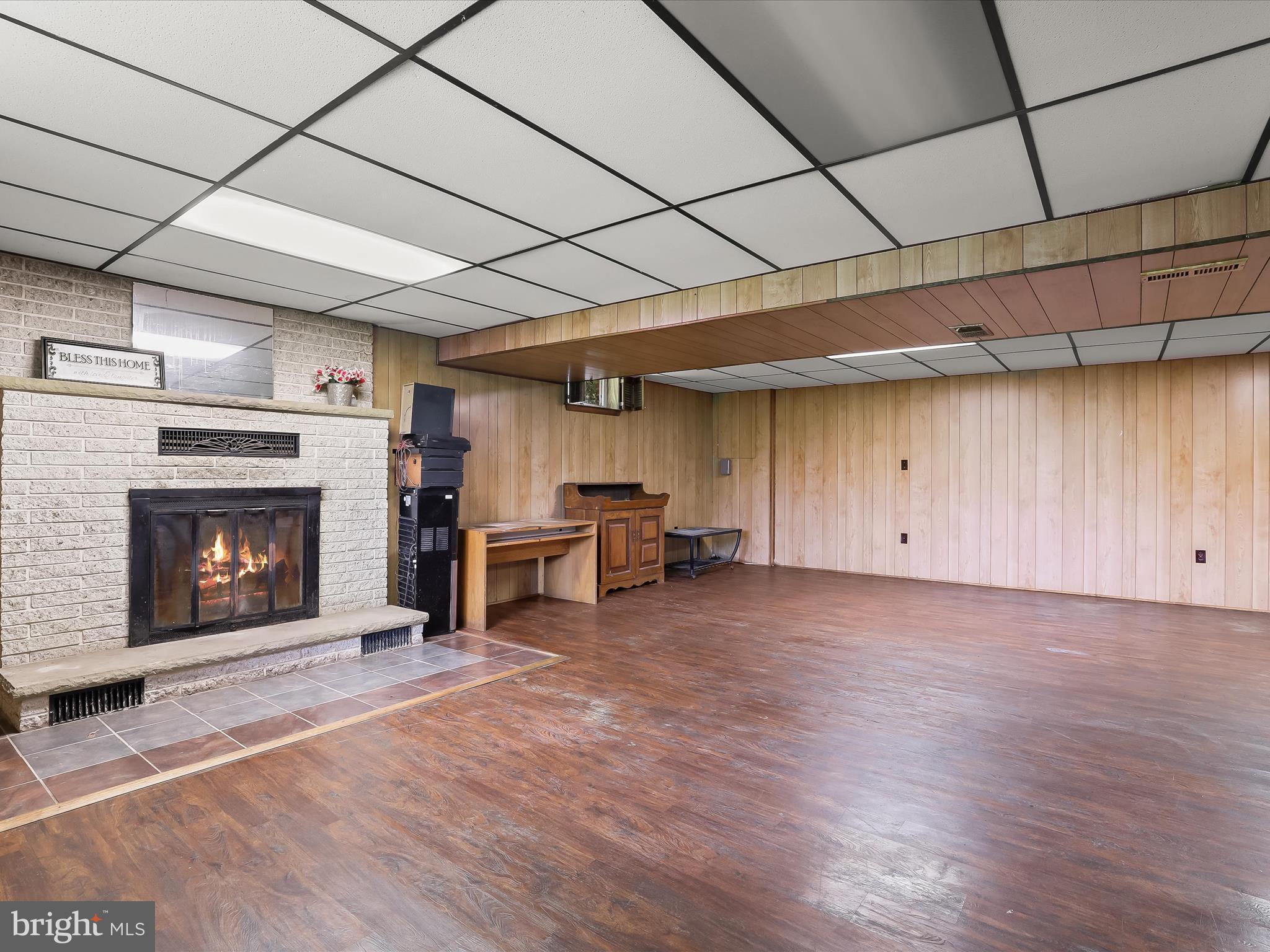 4704 Baughman Mill Road Manchester, MD 21102 - Photo 33 of 64 a view of an empty room with a fireplace