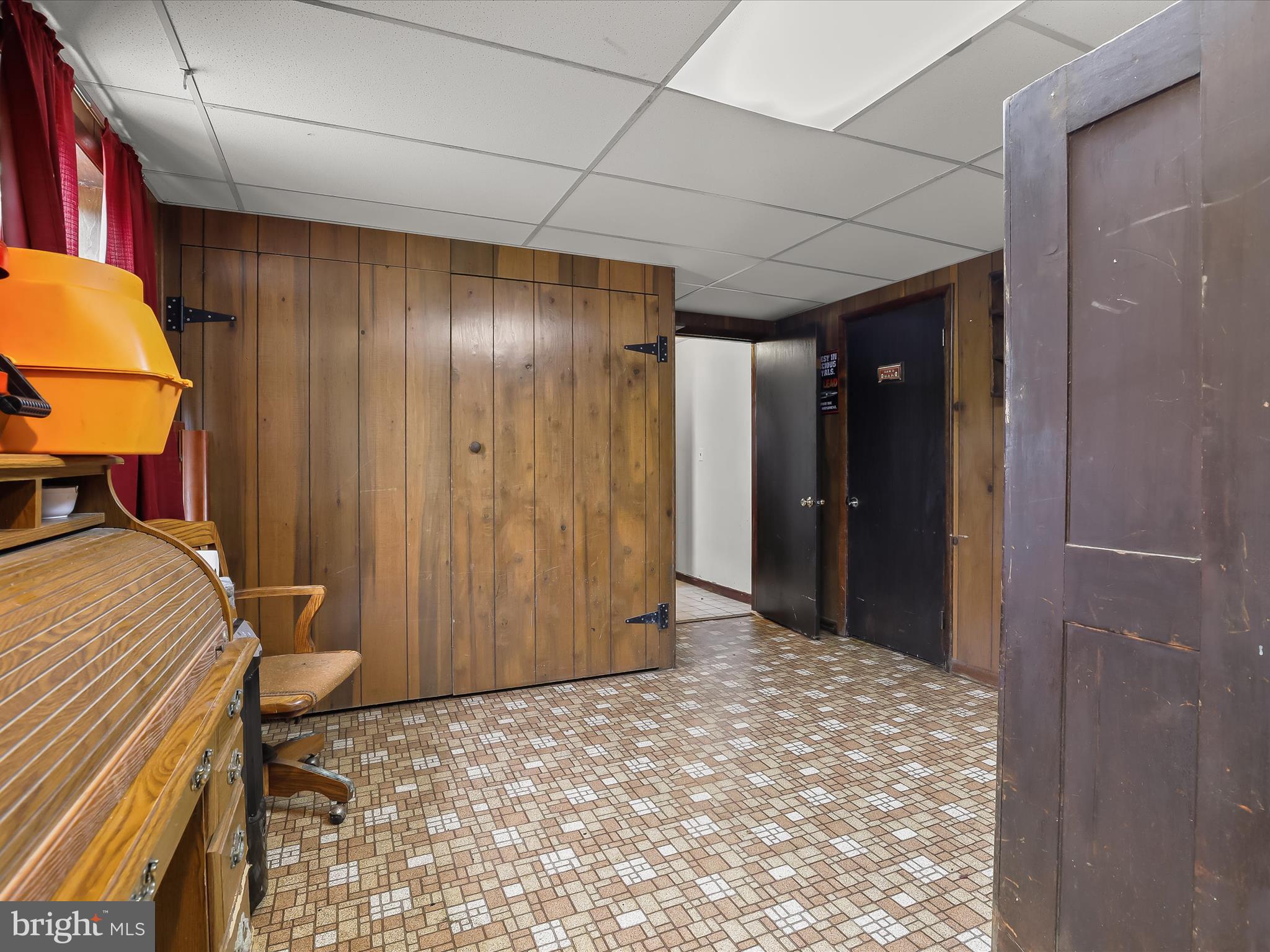 4704 Baughman Mill Road Manchester, MD 21102 - Photo 38 of 64 a bedroom with a bed and a chandelier