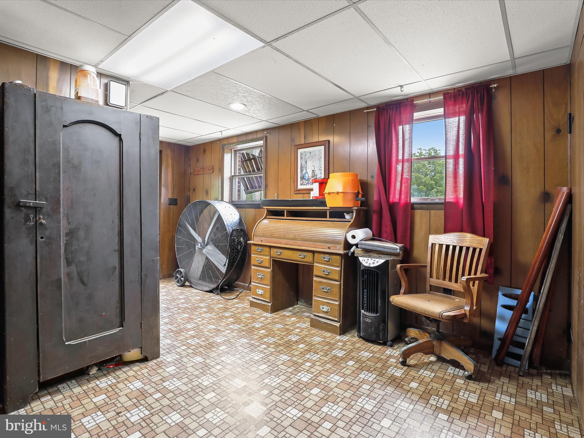 4704 Baughman Mill Road Manchester, MD 21102 - Photo 39 of 64 a room with furniture a flat screen tv and dresser