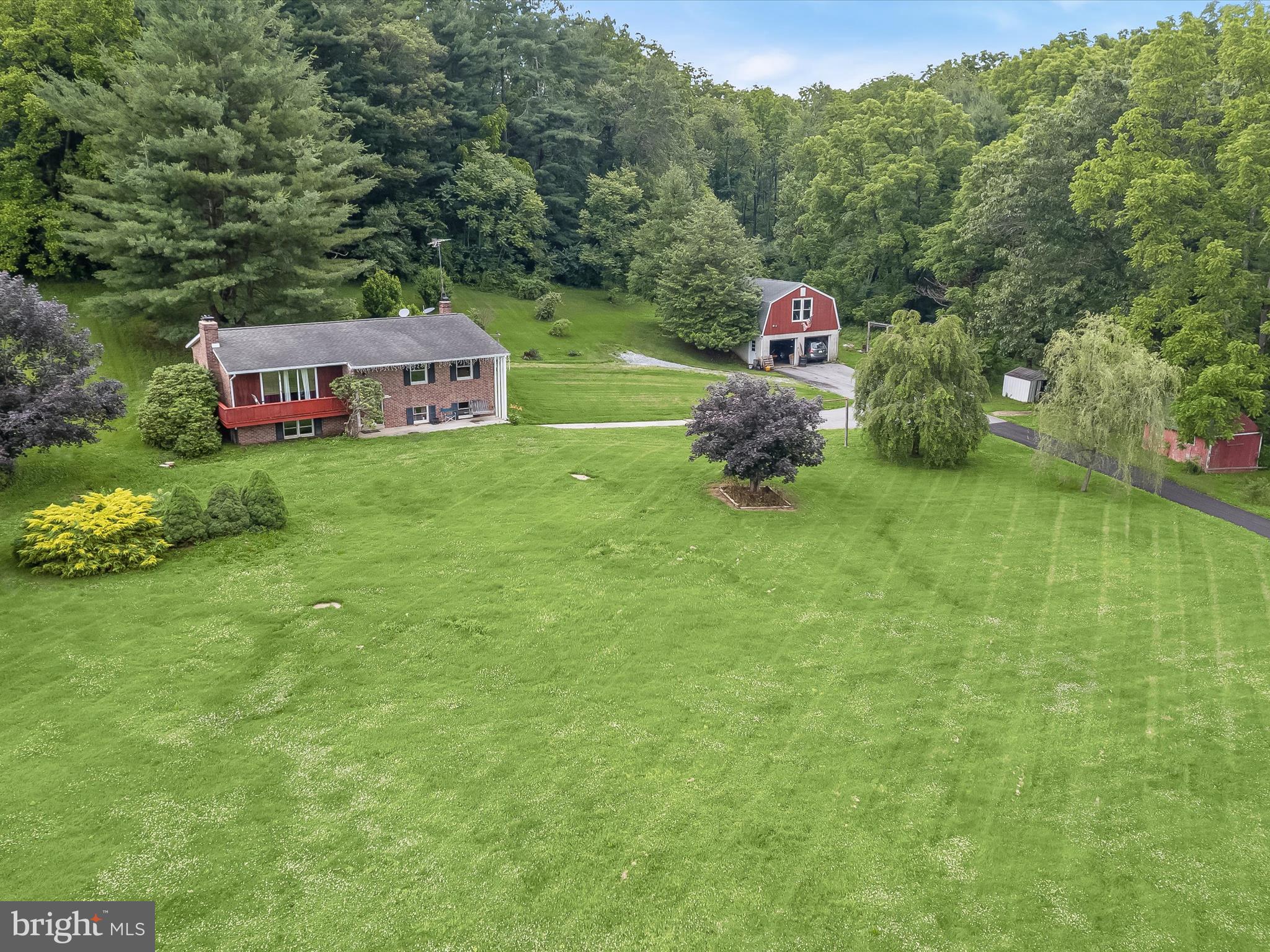 4704 Baughman Mill Road Manchester, MD 21102 - Photo 4 of 64 a view of a house with a yard