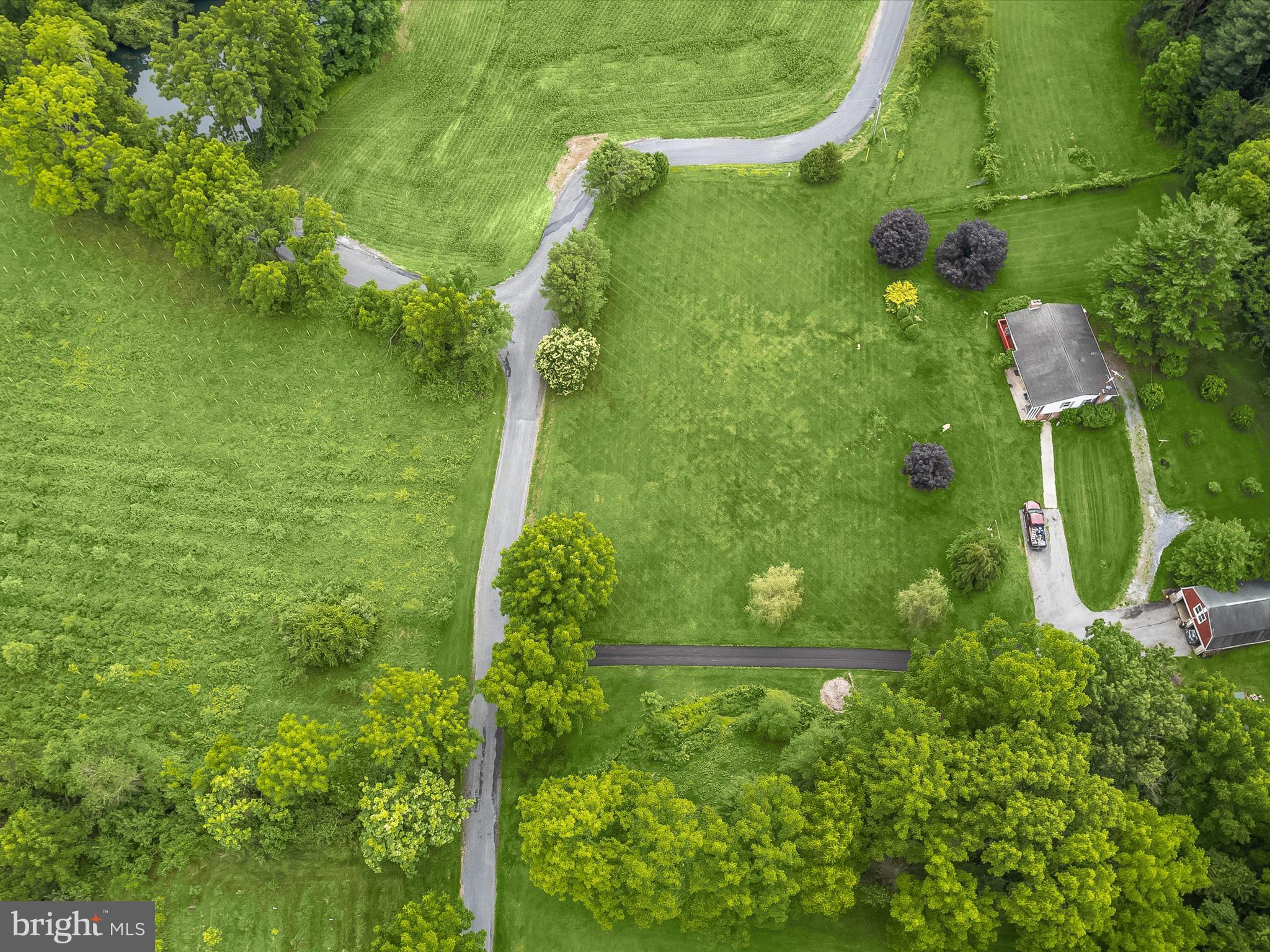 4704 Baughman Mill Road Manchester, MD 21102 - Photo 54 of 64 an aerial view of residential houses with outdoor space and trees