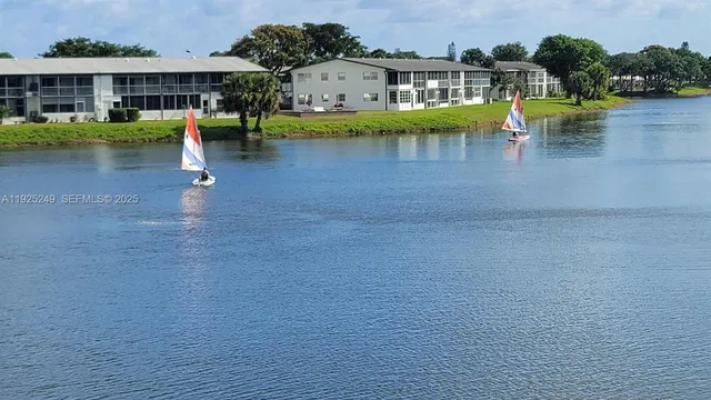 a view of a lake with a house