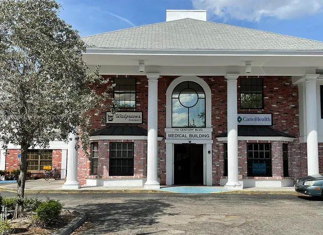 a front view of a building with street