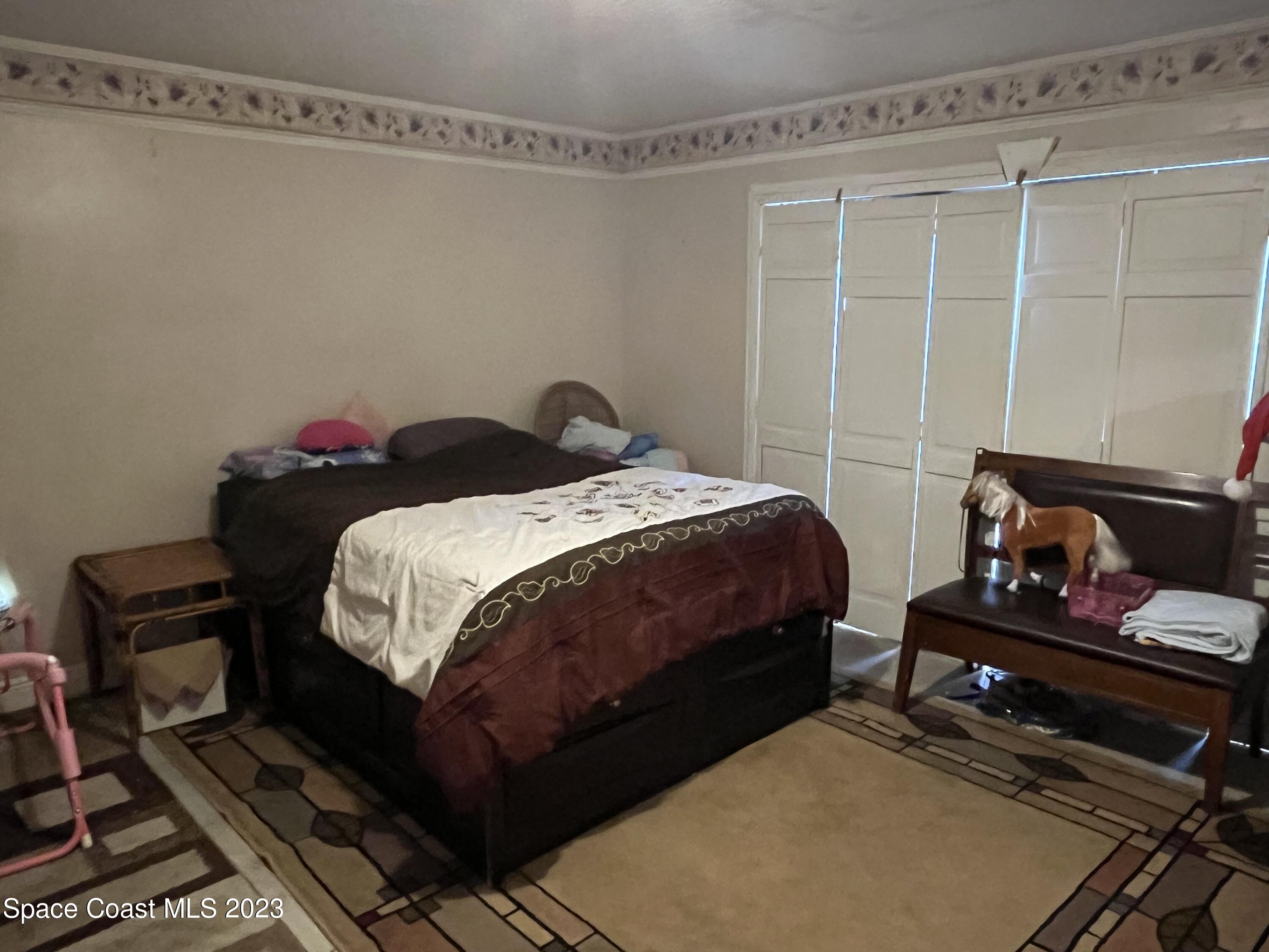 2265 Atz Road Malabar, FL 32950 - Photo 9 of 38 Downstairs bedroom 2