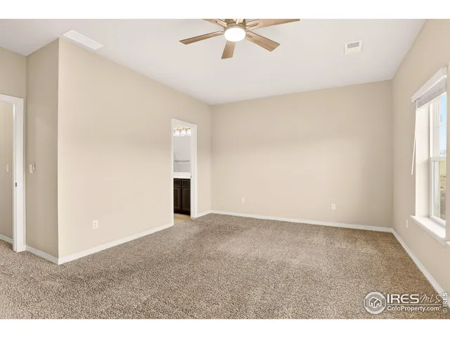 a bathroom with a sink a mirror and a shower