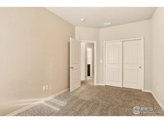 a bathroom with a sink a toilet a mirror a bathtub and shower