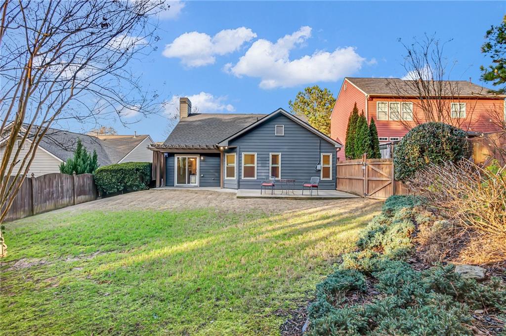 429 Arrowhead Trail Canton, GA 30114 - Photo 25 of 25 a front view of a house with garden