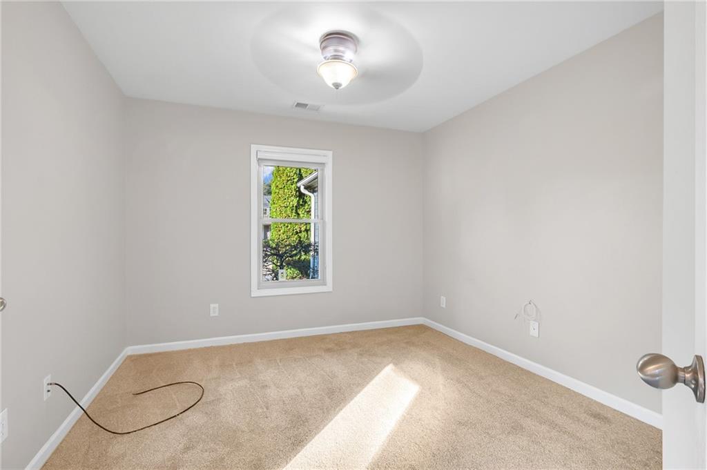 429 Arrowhead Trail Canton, GA 30114 - Photo 10 of 25 an empty room with a window