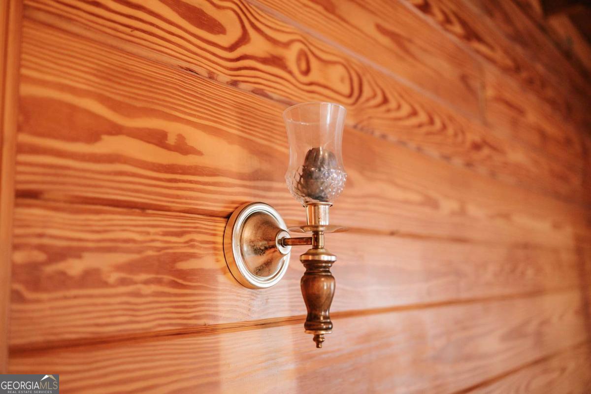 119 Ralph Bridges Road Lexington, GA 30648 - Photo 12 of 65 a view of a livingroom with a pathway