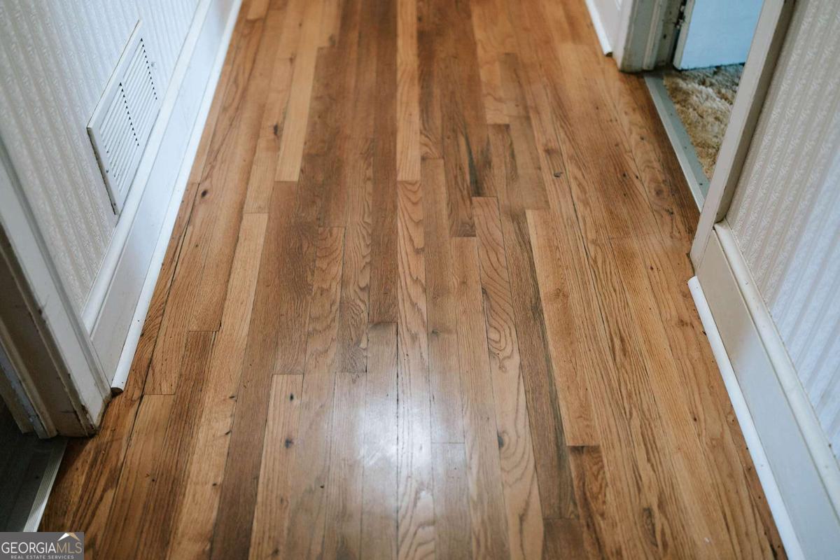 119 Ralph Bridges Road Lexington, GA 30648 - Photo 29 of 65 a close view of wooden floor and glass door