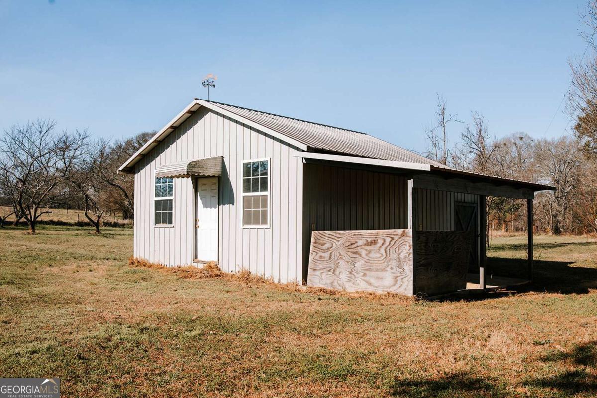 119 Ralph Bridges Road Lexington, GA 30648 - Photo 38 of 65 a front view of a house with a yard