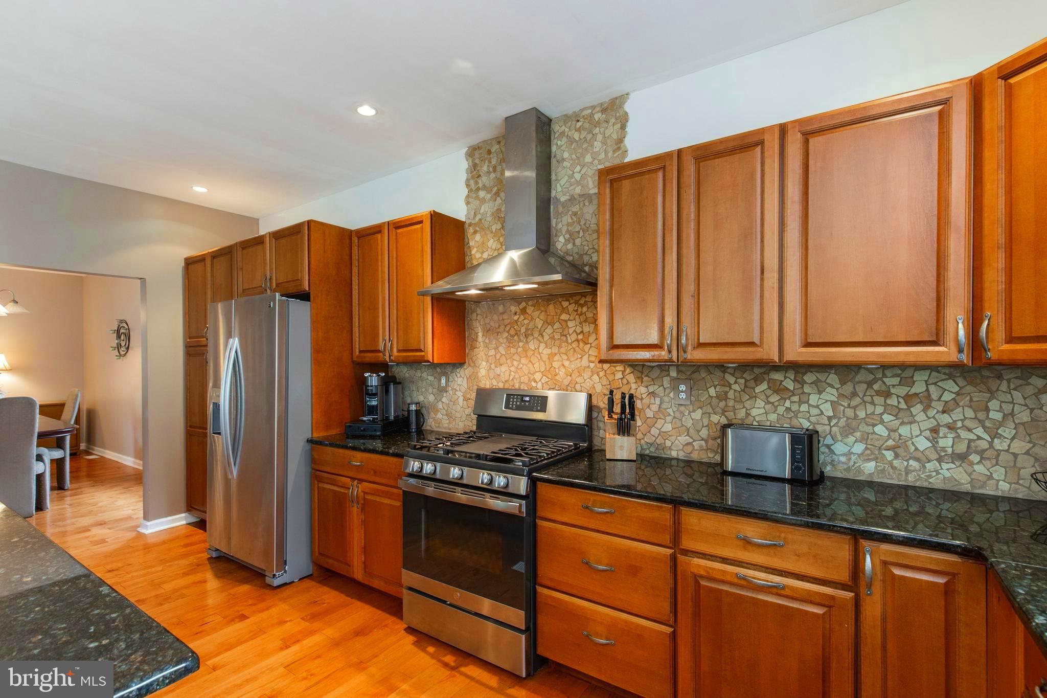 1536 Ashton Road Havertown, PA 19083 - Photo 14 of 42 Kitchen with Gas Stove & Range Hood