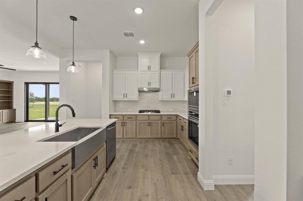 124 Evanston Court Rhome, TX 76078 - Photo 12 of 28 124 Evanston-Kitchen-3