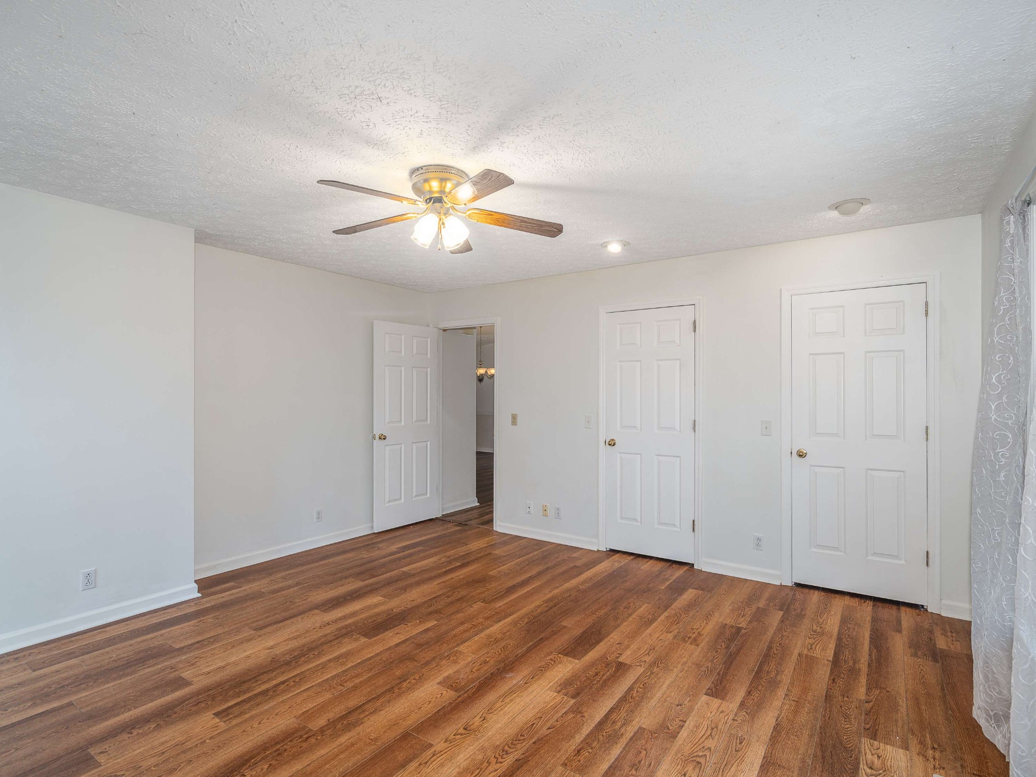 7125 Sutton Place Fairview, TN 37062 - Photo 22 of 36 a view of an empty room and chandelier fan