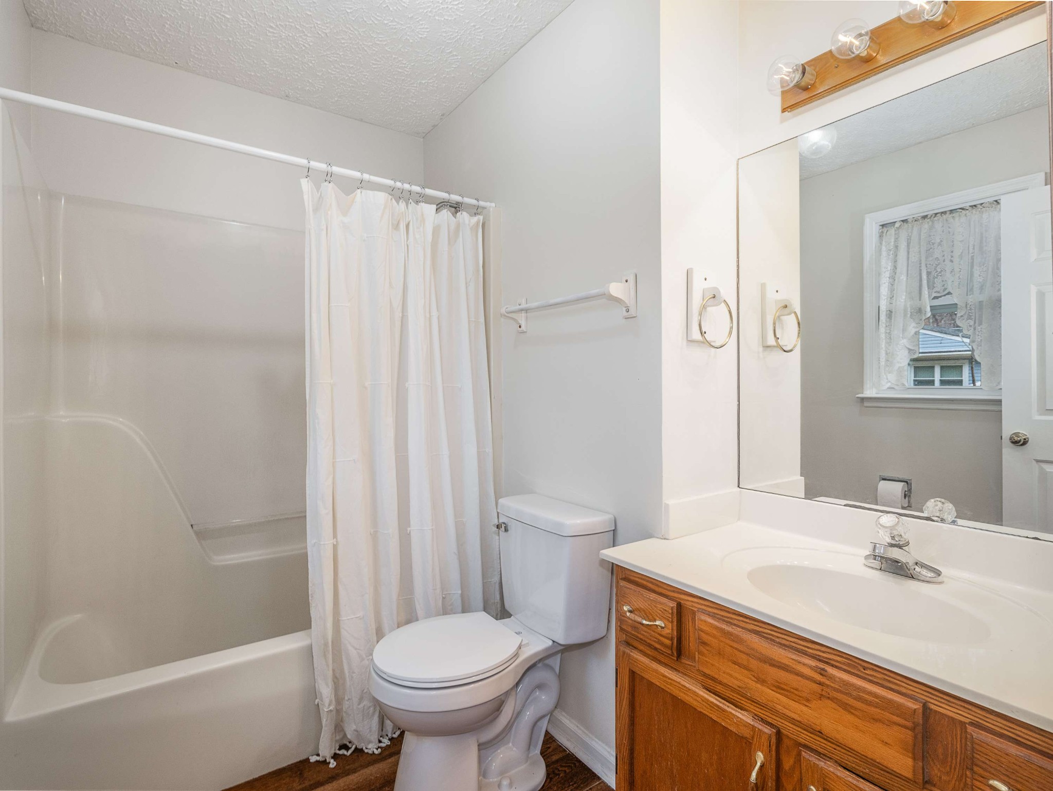 7125 Sutton Place Fairview, TN 37062 - Photo 23 of 36 a bathroom with a sink toilet and shower