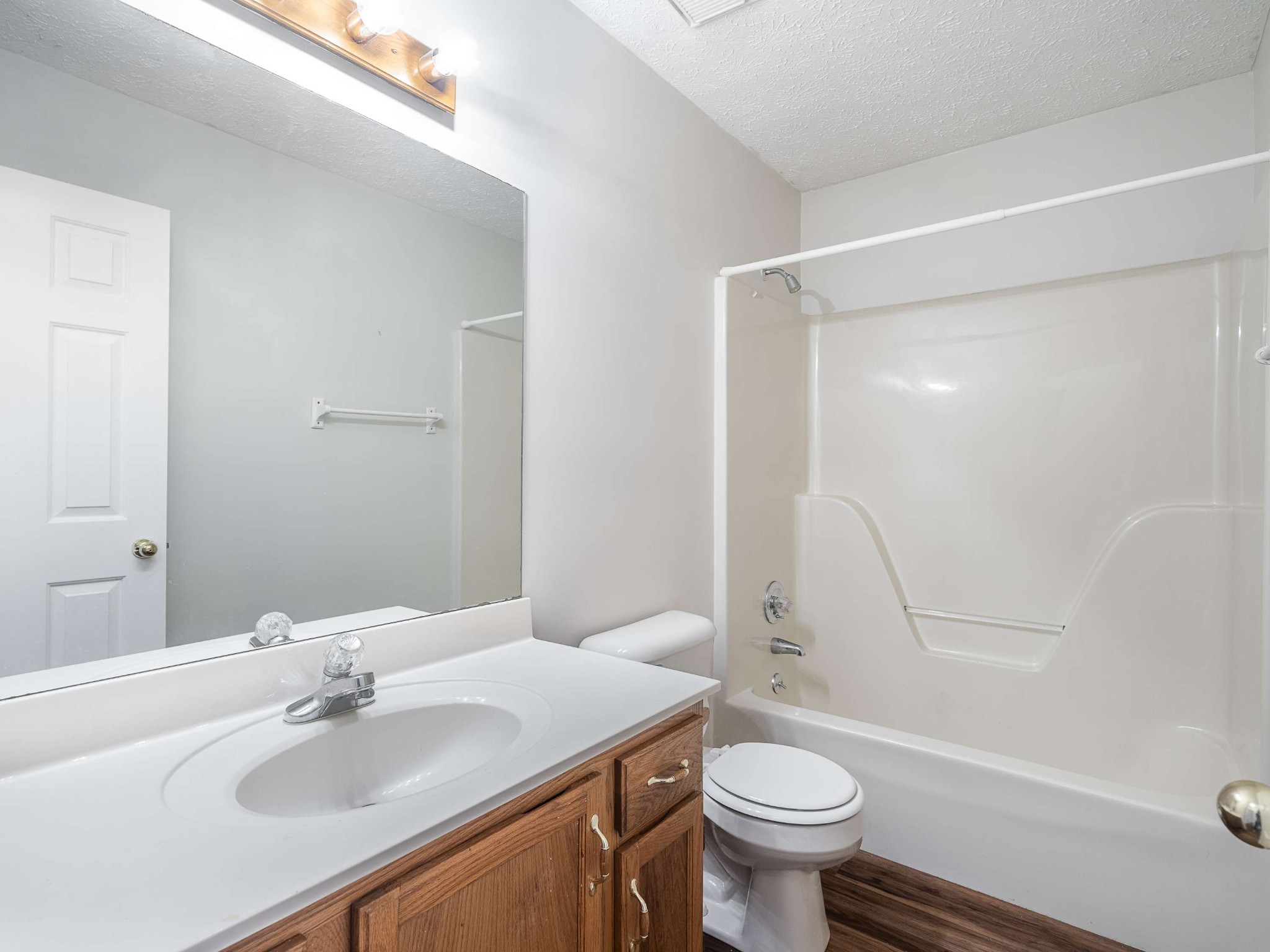 7125 Sutton Place Fairview, TN 37062 - Photo 24 of 36 a bathroom with a sink toilet and a mirror