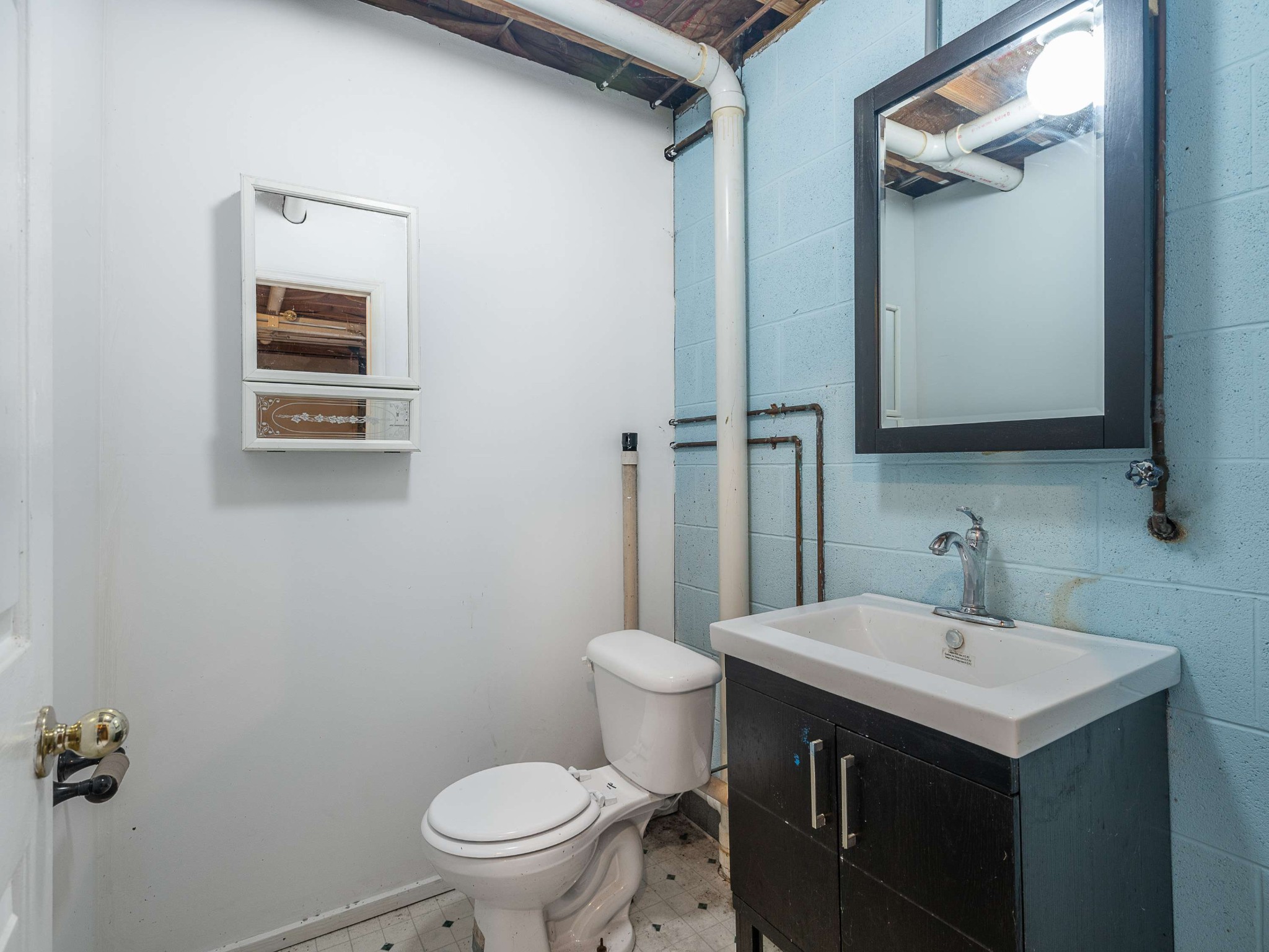 7125 Sutton Place Fairview, TN 37062 - Photo 30 of 36 a bathroom with a sink and a toilet