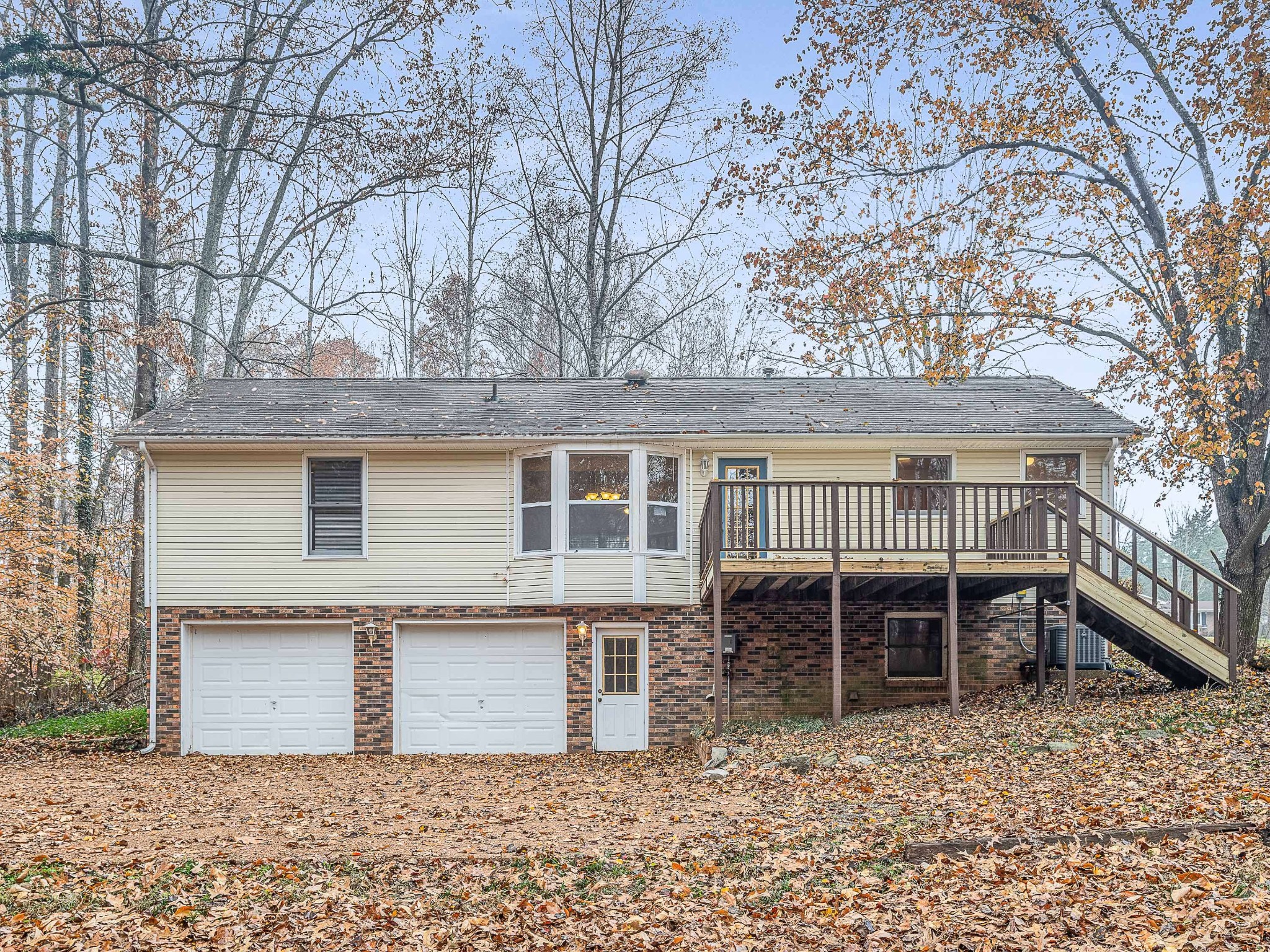 7125 Sutton Place Fairview, TN 37062 - Photo 7 of 36 a front view of a house with a chair and table
