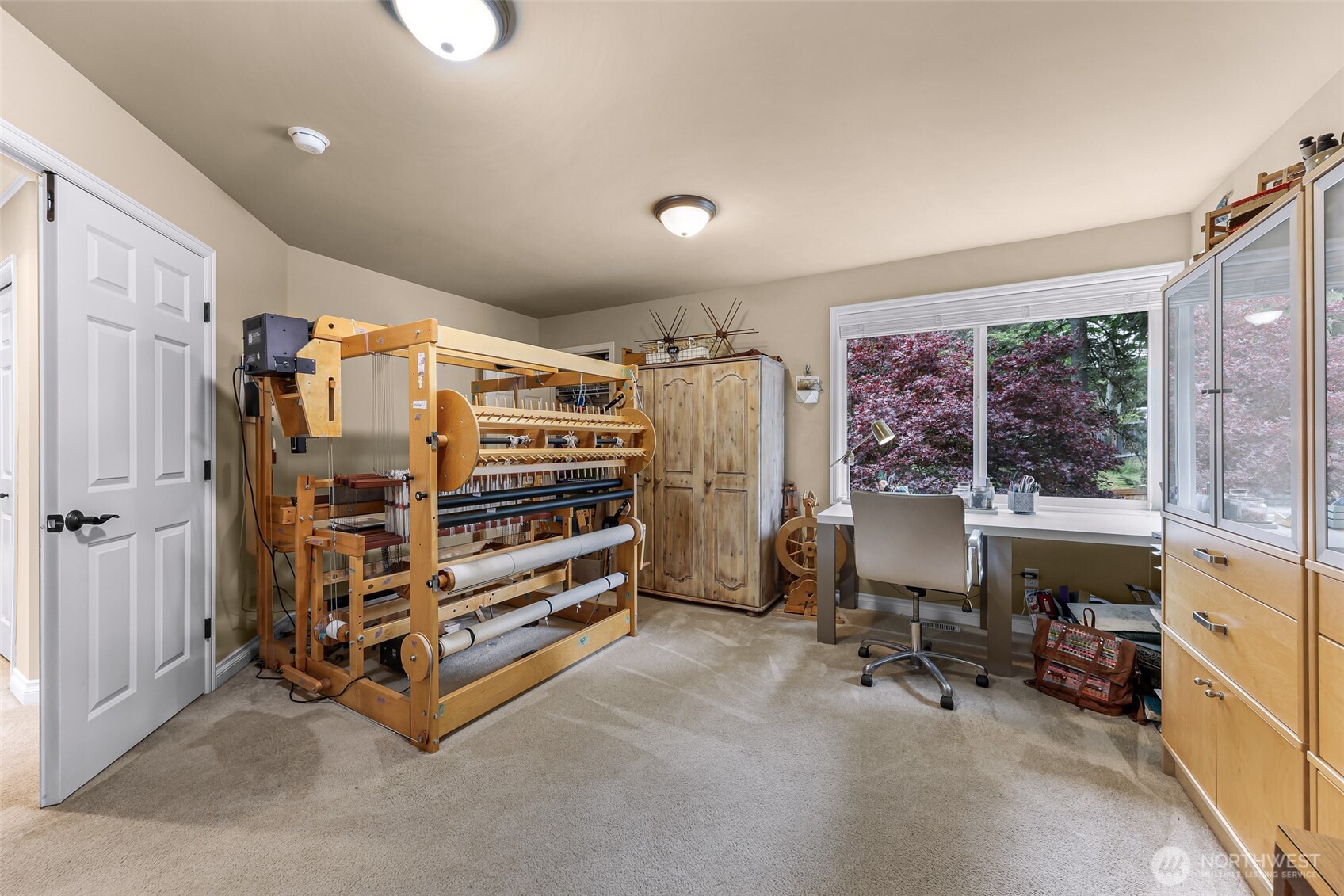 2029 240th Place Southeast Bothell, WA 98021 - Photo 30 of 39 a view of a bedroom with workspace and windows