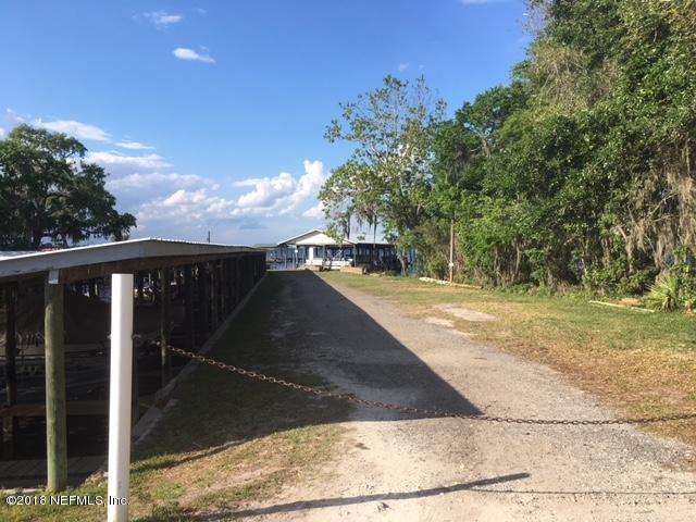 101 Pine Tree Trail Crescent City, FL 32112 - Photo 4 of 6 Pontoon Boat house