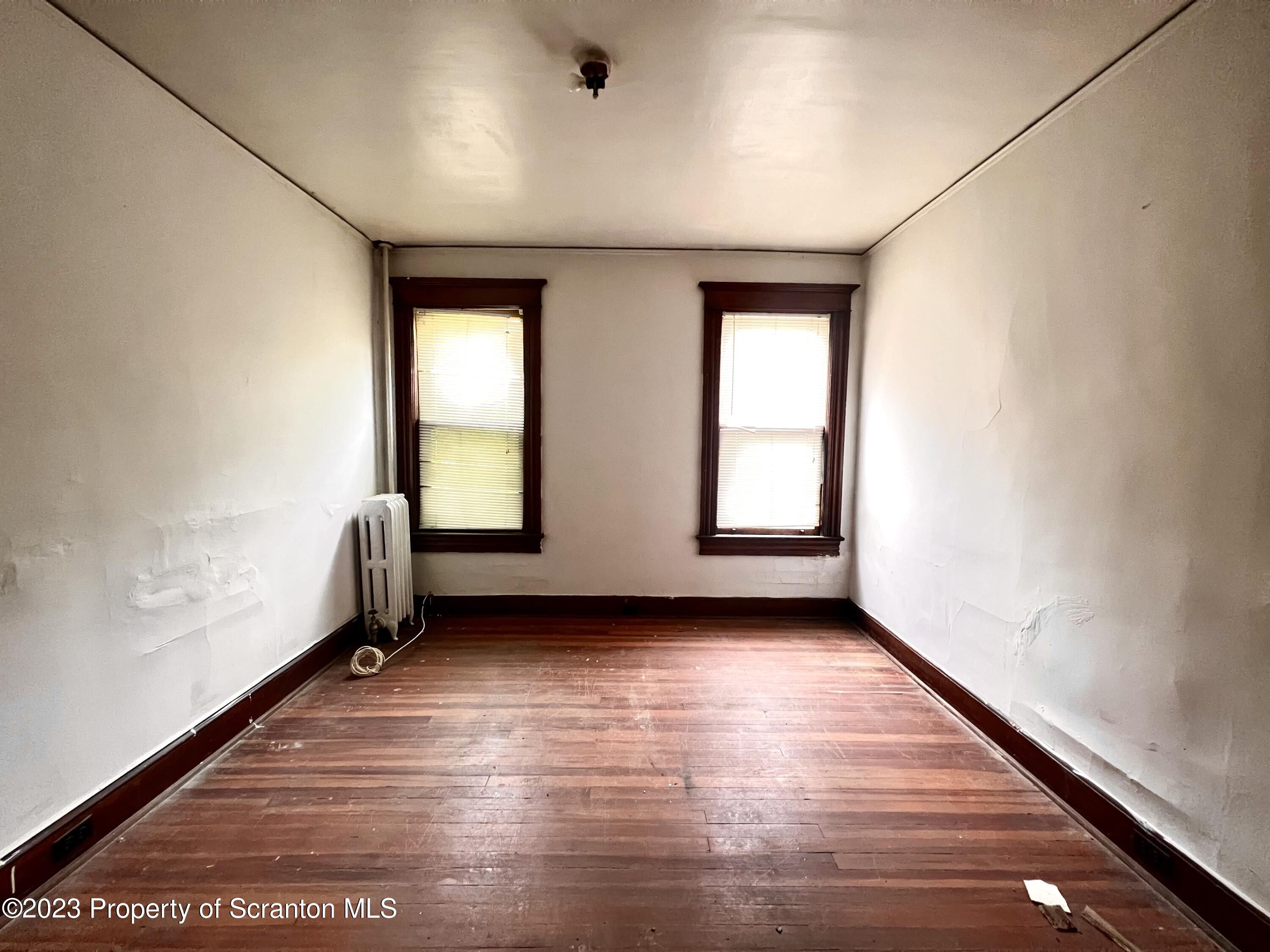 352-354 Maple Street Scranton, PA 18505 - Photo 4 of 22 an empty room with windows