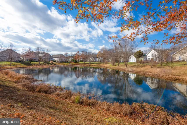 a view of residential houses with outdoor space
