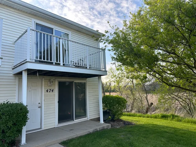 a house with garden in front of it