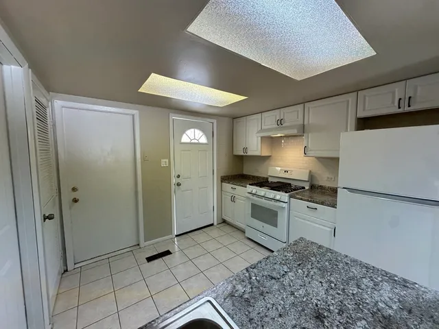 a bathroom with a toilet and a sink