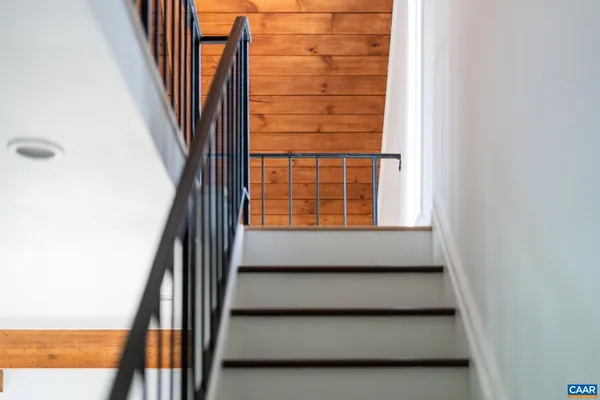 a view of a balcony with wooden floor