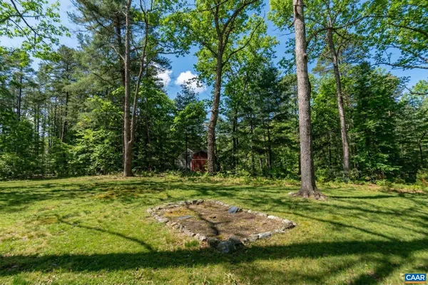 a view of bathroom with a lake view