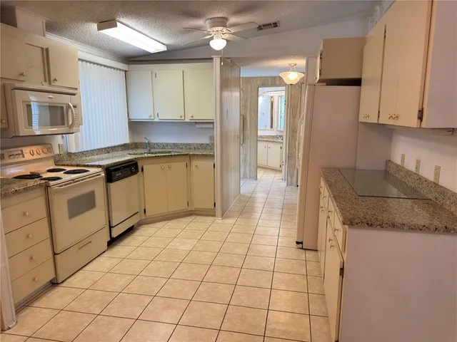 a bathroom with a tub and a shower