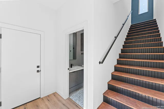 a view of entryway with wooden floor