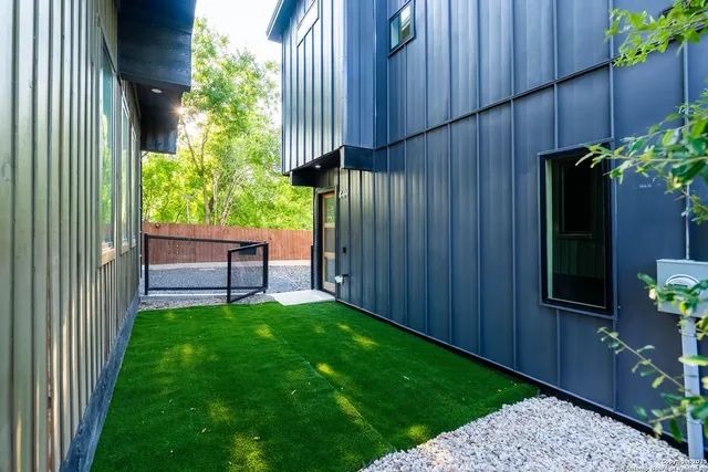 a view of a back yard from a backyard