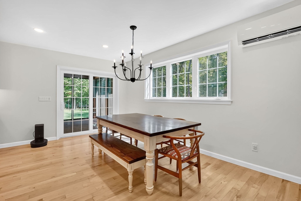 41 Dennis Road Longmeadow, MA 01106 - Photo 10 of 41 a view of a room with windows chandelier and wooden floor
