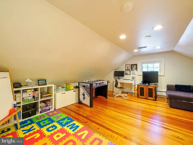 a bedroom with bed and window
