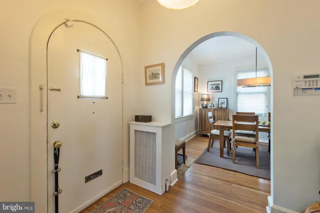 a view of a livingroom with furniture and wooden floor