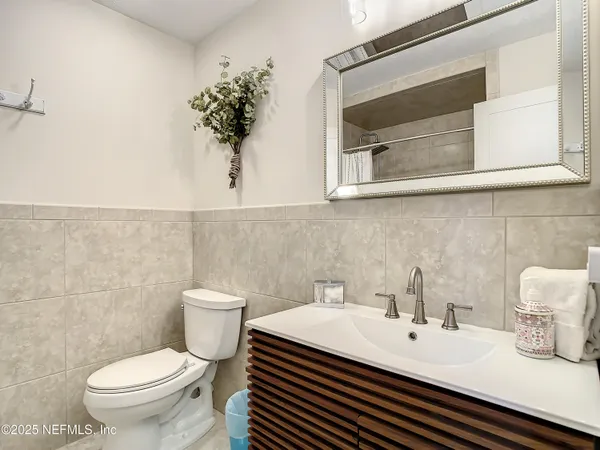 a bathroom with a sink and a toilet