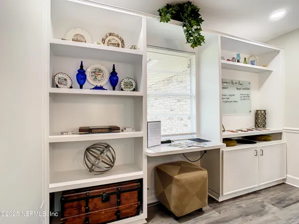 a kitchen with a stove and cabinets