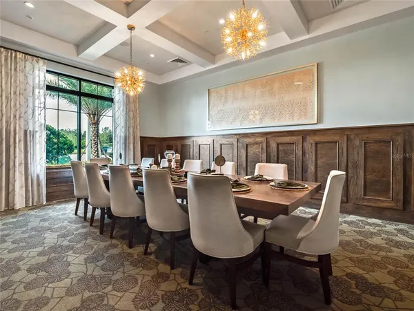 a view of a swimming pool with a yard