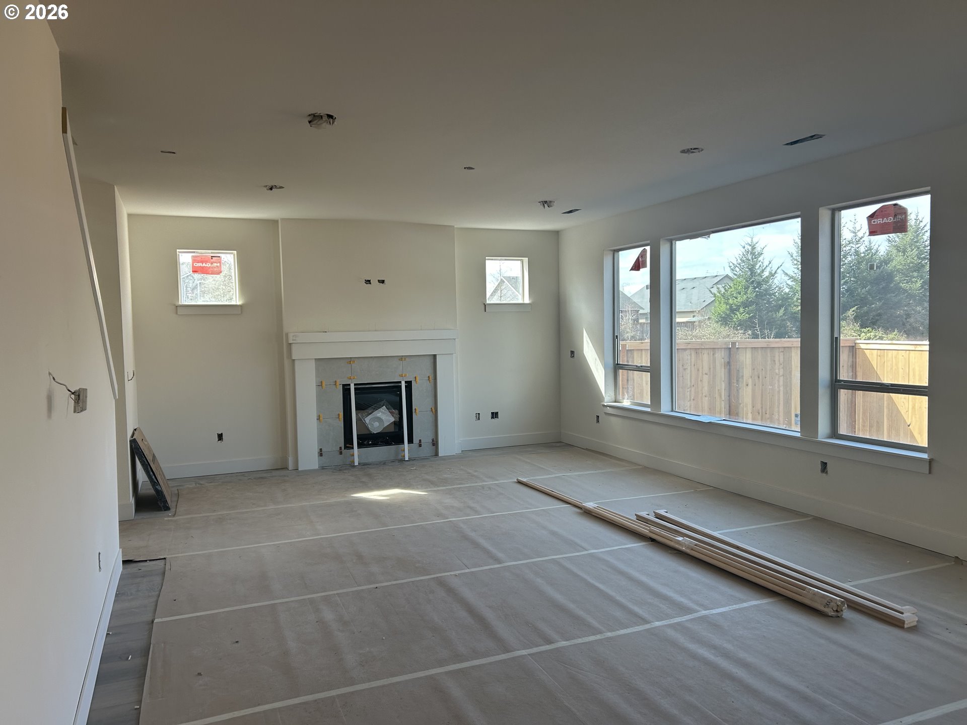 1160 Rachel Lane Molalla, OR 97038 - Photo 5 of 5 a view of an empty room with a fireplace and a window