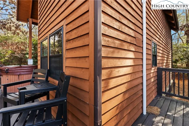 a front view of a house with a large window
