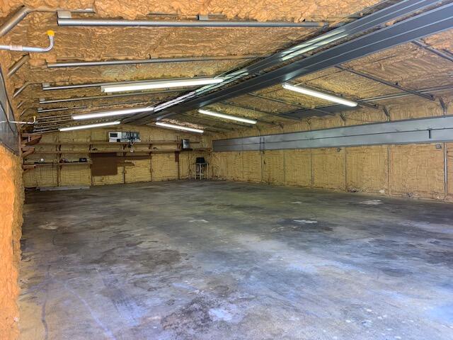 2727 Bacom Point Road Pahokee, FL 33476 - Photo 14 of 27 Inside storage garage