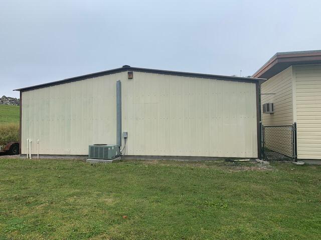 2727 Bacom Point Road Pahokee, FL 33476 - Photo 17 of 27 Back view of Storage garage