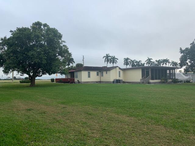 2727 Bacom Point Road Pahokee, FL 33476 - Photo 18 of 27 Exterior back view