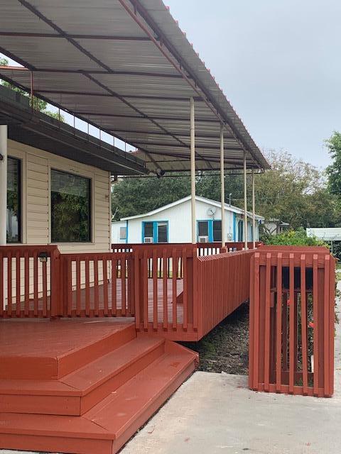 2727 Bacom Point Road Pahokee, FL 33476 - Photo 23 of 27 View of front porch