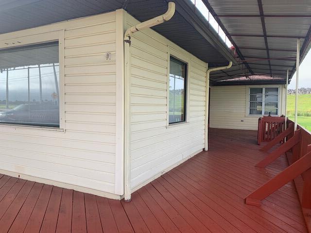 2727 Bacom Point Road Pahokee, FL 33476 - Photo 26 of 27 View of wrap around porch