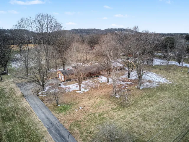 a view of residential houses with outdoor space