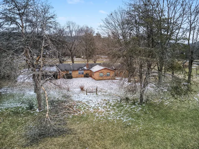 a fire hydrant in the middle of a field
